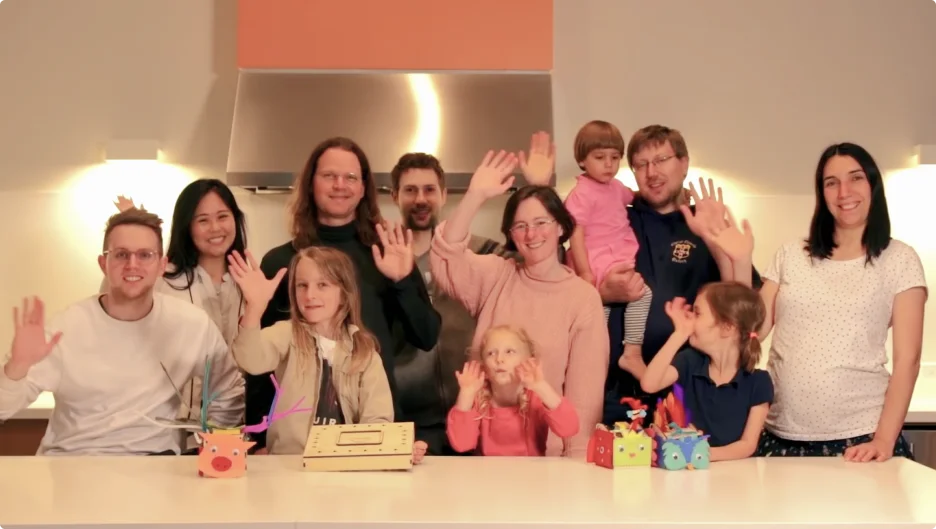 parents and children waving goodbye